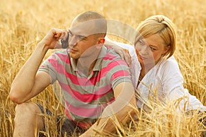 Couple with a mobile phone