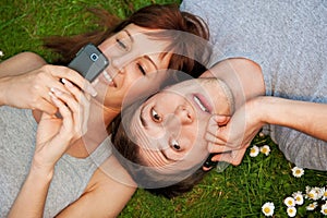 Couple with mobile phones outdoor