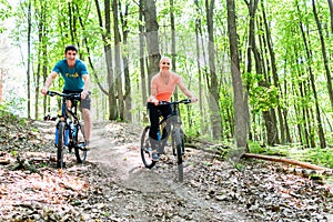 Couple on mountain bike bicycle