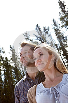 Couple, nature and view outdoor with travel for vacation, man and woman with fresh air for bonding in environment. Love