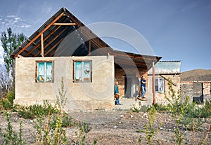 Couple near old house