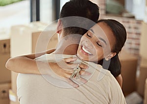 Couple, new home and happy hug with key, property investment or purchase and mortgage with partners. Ownership, together