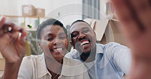 Couple, new house and selfie with boxes and key for celebration, mortgage or investment with smile. African, man and