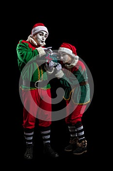 Couple of New Year elf mimes isolated