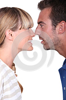 Couple with noses together