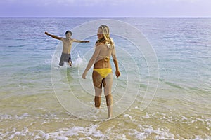 Couple in the ocean in hawaii