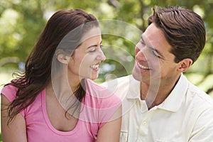 Couple outdoors smiling