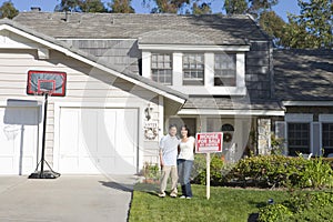 Couple Outside There House