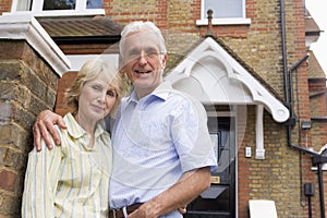 Couple Outside There House