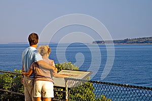 Couple overlooking ocean