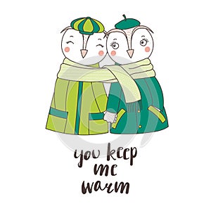 A couple of owls wrapped in one scarf