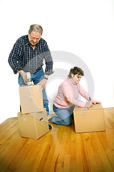 Couple packing boxes