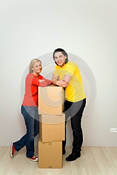 Couple with packing boxes