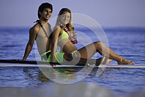 Couple on a paddleboard photo