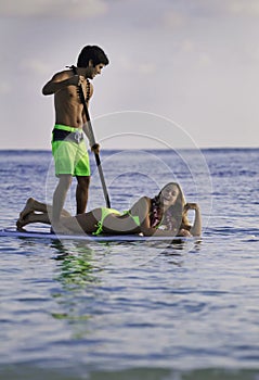 Couple on a paddleboard photo