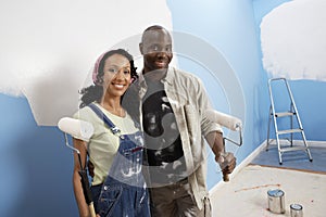 Couple Painting Their New House