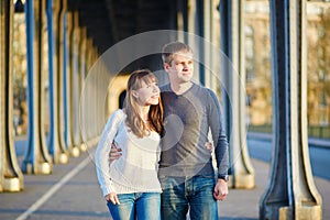 Couple in Paris on the Bir Hakeim bridge