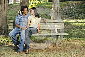 Couple on park bench.