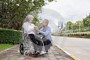 Couple in the park near home to relax, health and exercise in love sports, old man and senior woman taking a walk outdoors