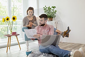 Couple paying bills online