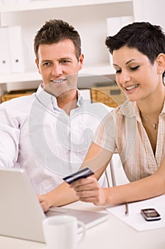 Couple paying with credit card