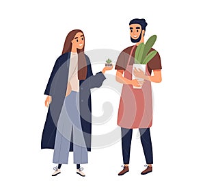 Couple of people with potted interior plants in hands. Man and woman talking about houseplants. Botanist advisor photo