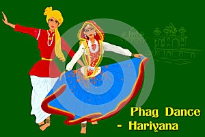 Couple performing Phag folk dance of Haryana, India photo