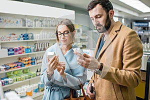 Couple in the pharmacy store