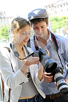 Couple of photographers shooting in town