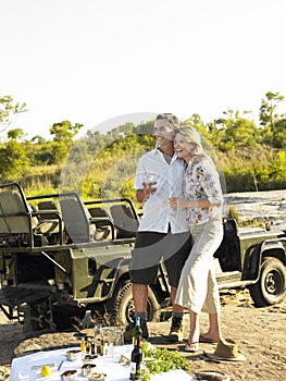 Couple On Picnic During Safari By Jeep