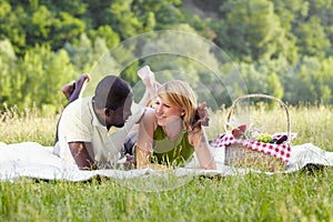 Couple picnicking in park photo