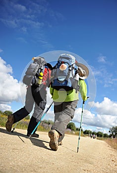 Couple of pilgrims on the Camino de Santiago, Spain, Way to Santiago