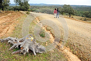 Couple of pilgrims in the Via de la Plata, El Berrocal in Almaden de la Plata, Sevilla province, Andalusia, Spain photo