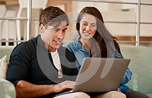 Couple, planning and chat with laptop in home with ideas for property, development or real estate. Mortgage, loan and