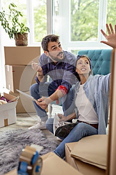 Couple planning home redecoration photo