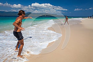 Couple play badminton