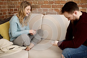 Couple playing with cards.