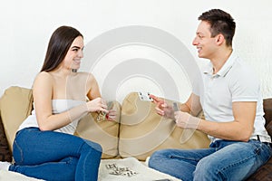 Couple playing cards enjoying game