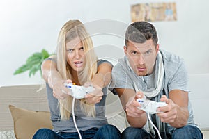 Couple playing computer game