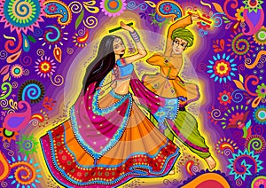 Couple playing Garba in Dandiya Night Navratri Dussehra festival