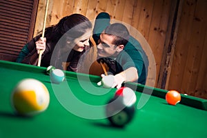 Couple Playing Pool