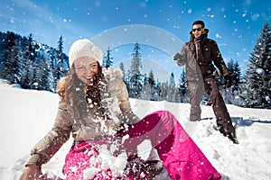 Couple playing in snow