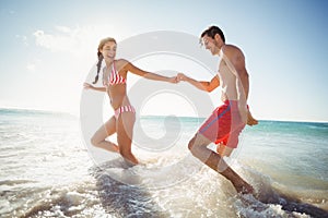 Couple playing in water