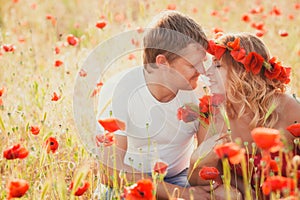 Couple on the poppy meadow