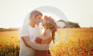 Couple on the poppy meadow