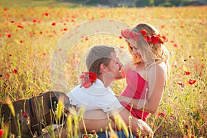 Couple on the poppy meadow