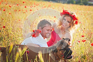 Couple on the poppy meadow