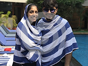 Couple posing after a dip in the Pool