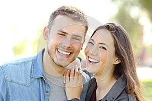 Couple posing with perfect smile and white teeth photo