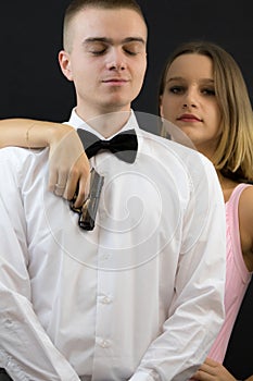 Couple posing in secret agent style